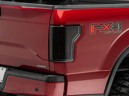 Raxiom 15-17 Ford F-150 Axial Series LED Tail Lights- Black Housing (Smoked Lens)