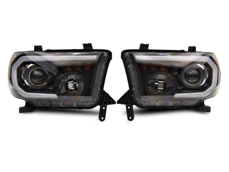 Raxiom 07-13 Toyota Tundra Axial Projector Headlights w/ SEQL LED Bar- Black Housing (Clear Lens)
