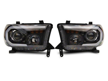 Raxiom 07-13 Toyota Tundra Axial Projector Headlights w/ SEQL LED Bar- Black Housing (Clear Lens)