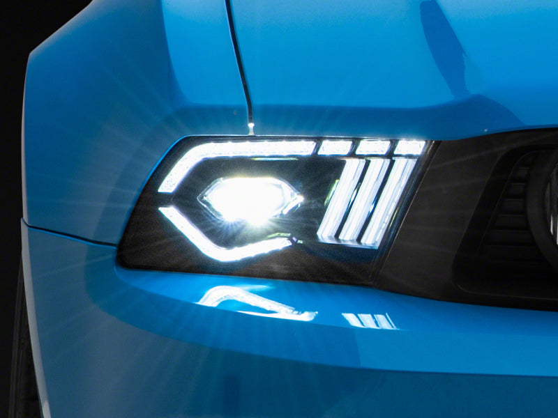 Raxiom 10-12 Ford Mustang w/ Factory Halogen LED Projector Headlights- Black Housing (Clear Lens)