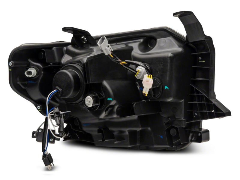 Raxiom 14-21 Toyota Tundra Axial Projector Headlights w/ SEQL LED Bar- Black Housing (Clear Lens)