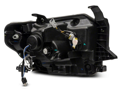 Raxiom 14-21 Toyota Tundra Axial Projector Headlights w/ SEQL LED Bar- Black Housing (Clear Lens)