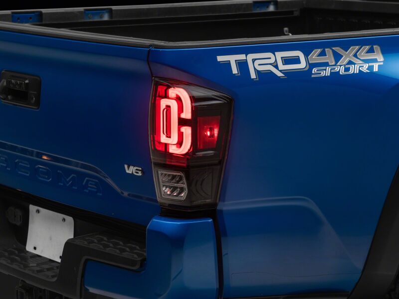 Raxiom 16-23 Toyota Tacoma XW Series Sequential LED Tail Lights- Black Housing- Clear Lens