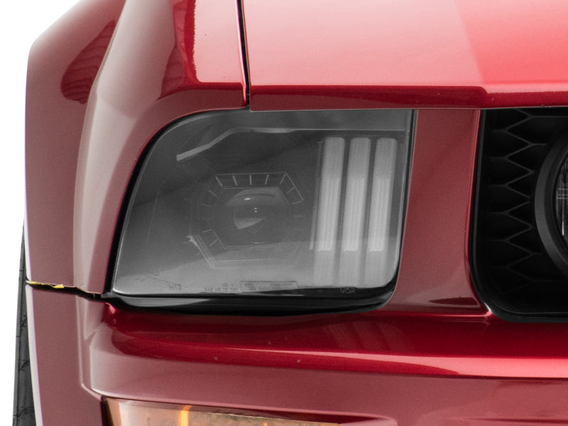 Raxiom 05-09 Ford Mustang w/ Halogen Projector Headlights- Black Housing (Clear Lens) (No GT500 )
