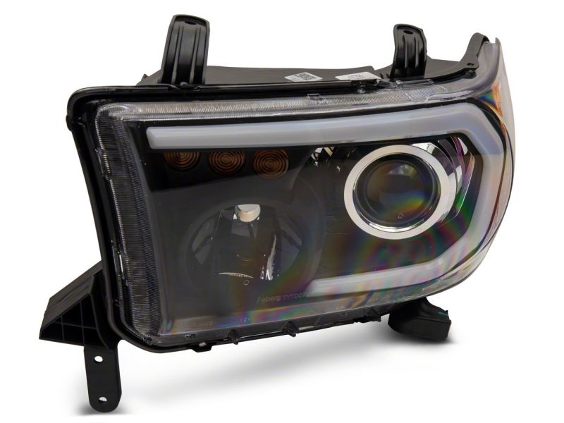 Raxiom 07-13 Toyota Tundra Axial Series Projector Headlights w/ LED Bar- Black Housing (Clear Lens)