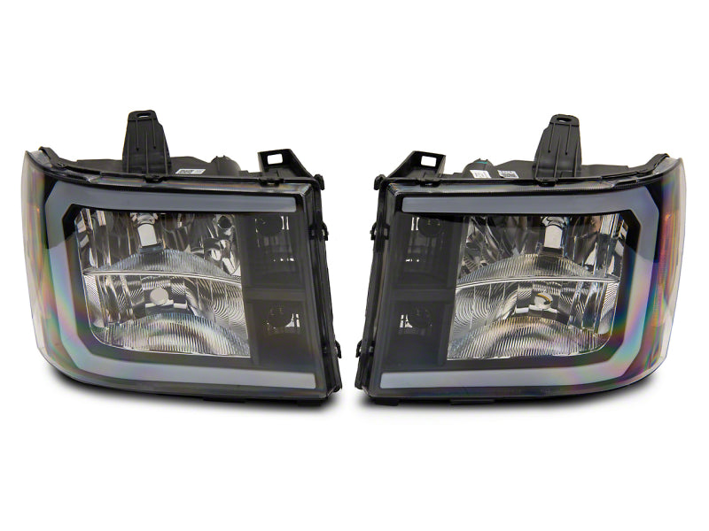 Raxiom 07-13 GMC Sierra 1500 Axial Series Headlights w/ LED Bar- Black Housing (Clear Lens)