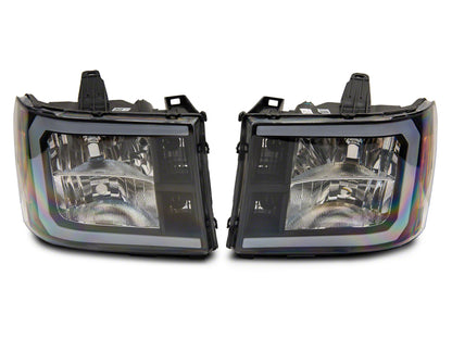 Raxiom 07-13 GMC Sierra 1500 Axial Series Headlights w/ LED Bar- Black Housing (Clear Lens)