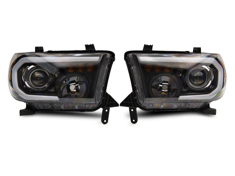 Raxiom 07-13 Toyota Tundra Axial Projector Headlights w/ SEQL LED Bar- Black Housing (Clear Lens)