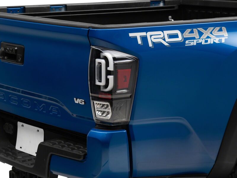 Raxiom 16-23 Toyota Tacoma XW Series Sequential LED Tail Lights- Black Housing- Clear Lens
