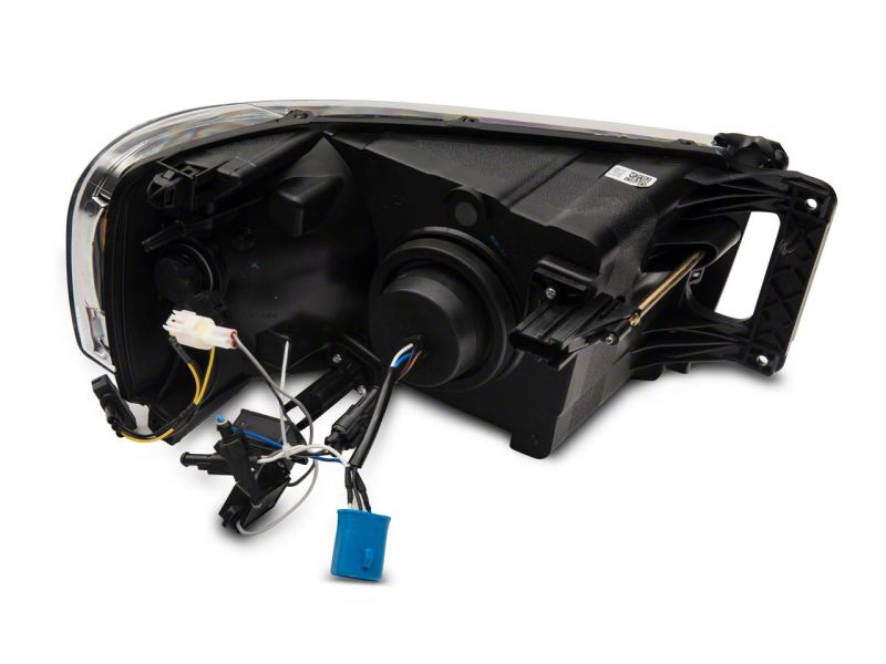 Raxiom 02-05 Dodge RAM 1500/2500/3500 Axial LED Projector Headlights- Black Housing (Clear Lens)