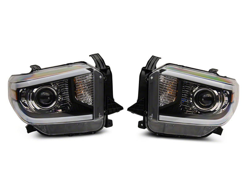 Raxiom 14-21 Toyota Tundra Axial Projector Headlights w/ SEQL LED Bar- Black Housing (Clear Lens)
