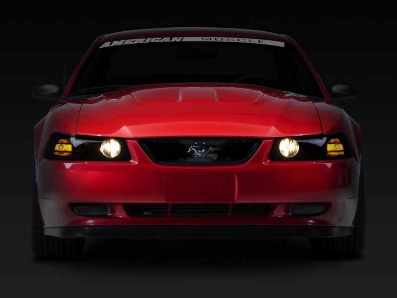 Raxiom 99-04 Ford Mustang Axial Series Projector Headlights- Black Housing (Smoked Lens)
