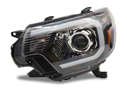 Raxiom 12-15 Toyota Tacoma Axial Projector Headlights w/ SEQL LED Bar- Black Housing (Clear Lens)