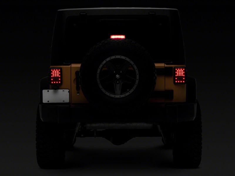 Raxiom 07-18 Jeep Wrangler JK Axial Series LED Tail Lights- Black Housing (Clear Lens)