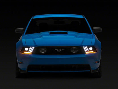 Raxiom 10-12 Ford Mustang LED Projector Headlights SEQL Turn Signals- Black Housing (Clear Lens)