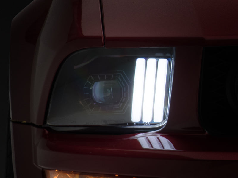 Raxiom 05-09 Ford Mustang w/ Halogen Projector Headlights- Black Housing (Clear Lens) (No GT500 )