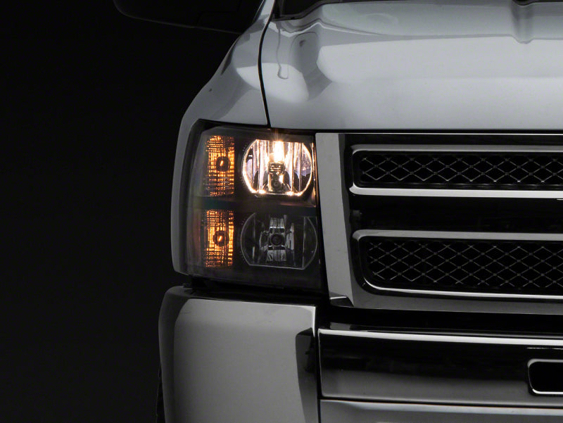 Raxiom 07-13 Chevrolet Silverado 1500 Euro Headlights- Black Housing (Clear Lens)
