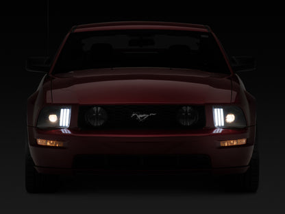 Raxiom 05-09 Ford Mustang w/ Halogen Projector Headlights- Black Housing (Clear Lens) (No GT500 )