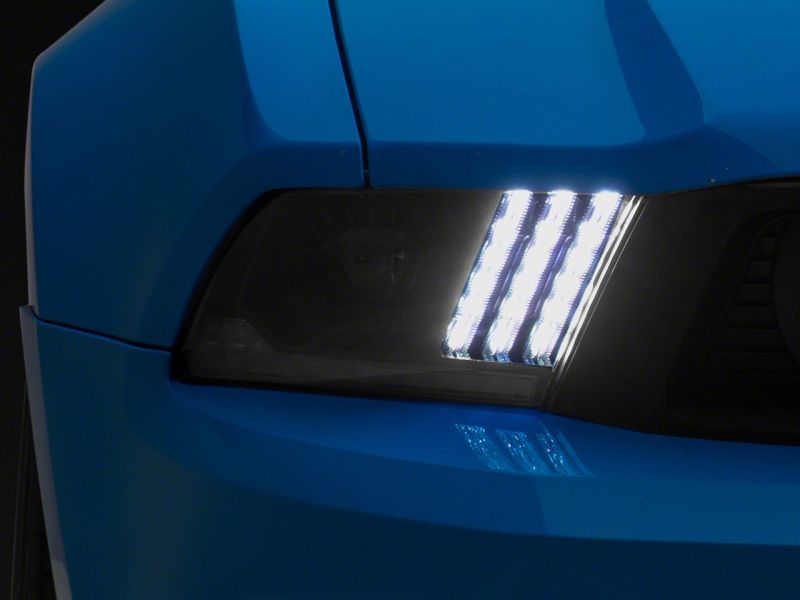 Raxiom 10-12 Ford Mustang LED Projector Headlights SEQL Turn Signals- Black Housing (Clear Lens)