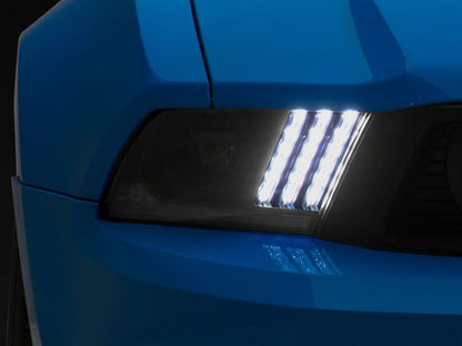Raxiom 10-12 Ford Mustang LED Projector Headlights SEQL Turn Signals- Black Housing (Clear Lens)