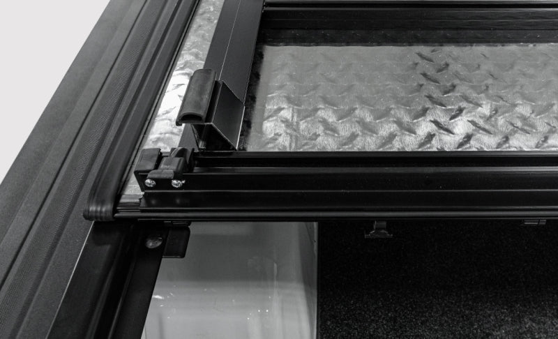 Access LOMAX 2022+ Rivian R1T 4ft 6in Bed (w/ OEM Tonneau Track) Folding Hard Cover - Carbon Fiber