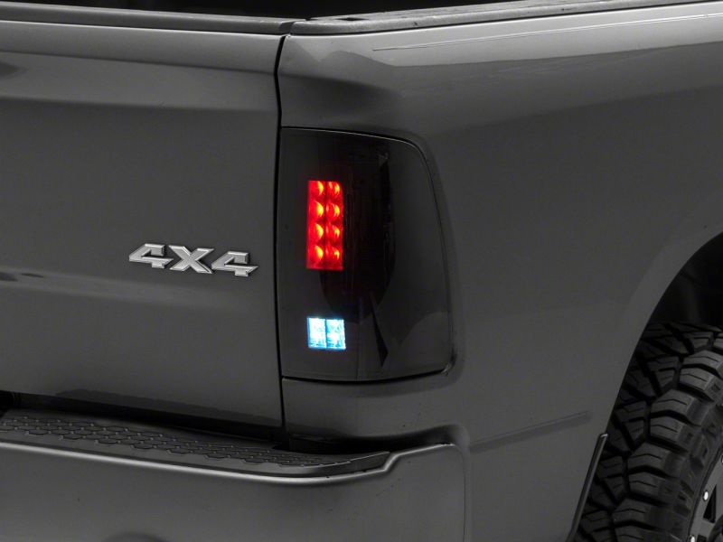 Raxiom 09-18 Dodge RAM 1500/2500/3500 Axial Series LED Tail Lights- Black Housing (Smoked Lens)