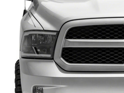 Raxiom 09-18 Dodge RAM 1500/2500/3500 Axial Series Headlights w/ LED Bar- Black Housing (Clear Lens)