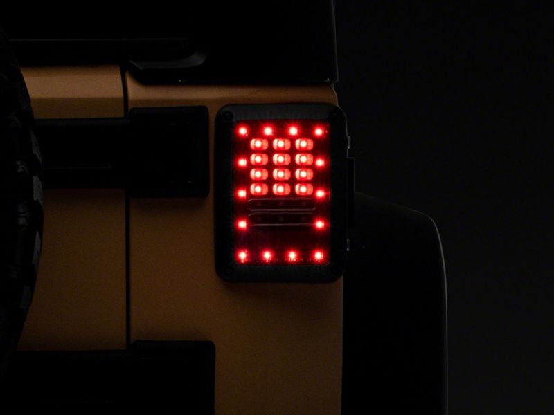 Raxiom 07-18 Jeep Wrangler JK Axial Series LED Tail Lights- Black Housing (Clear Lens)