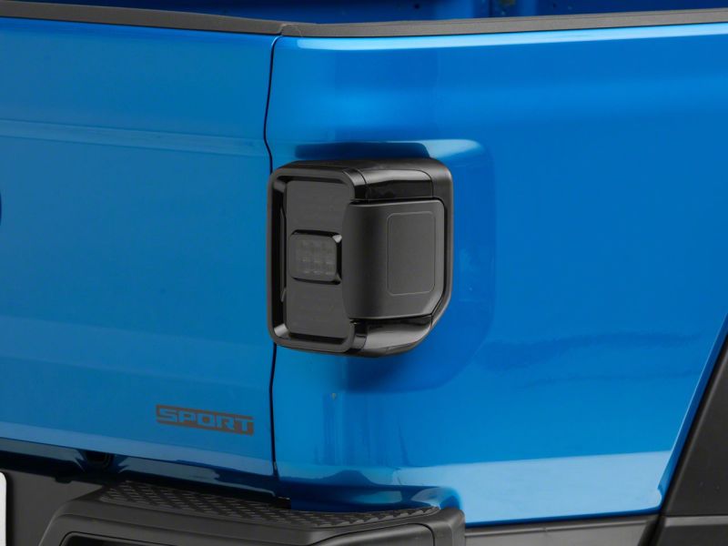 Raxiom 20-23 Jeep Gladiator JT w/ Factory Halogen LED Tail Lights- Black Housing (Smoked Lens)