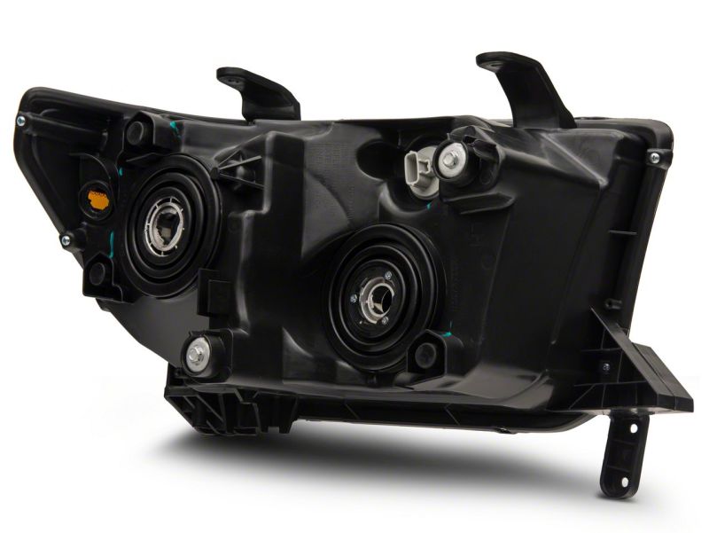 Raxiom 07-13 Toyota Tundra Axial Series Projector Headlights w/ LED Bar- Black Housing (Clear Lens)