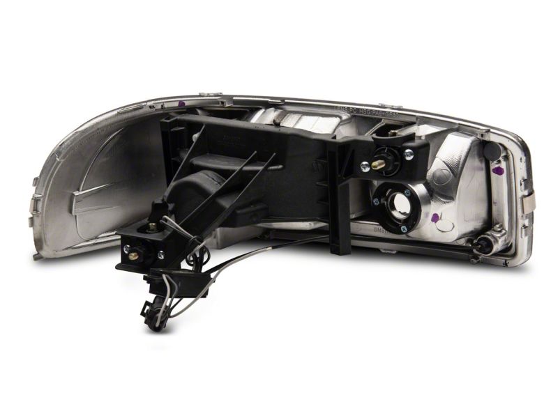 Raxiom 99-06 GMC Sierra 1500 Axial Series Headlights w/ LED Bar- Black Housing (Clear Lens)