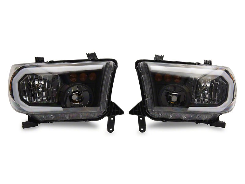 Raxiom 07-13 Toyota Tundra Axial Series Headlights w/ SEQL LED Bar- Black Housing (Clear Lens)