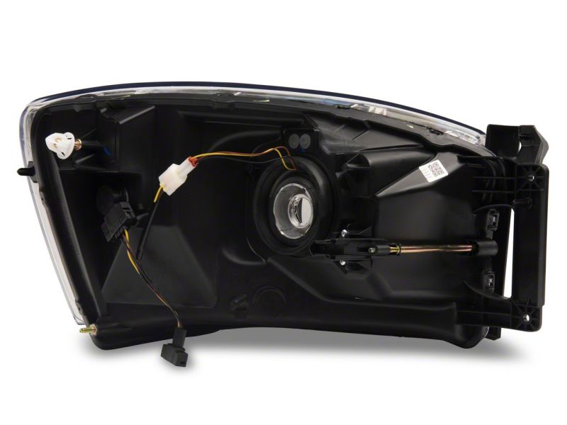Raxiom 06-09 Dodge RAM 1500/2500/3500 Axial Headlights w/ SEQL LED Bar- Black Housing (Clear Lens)