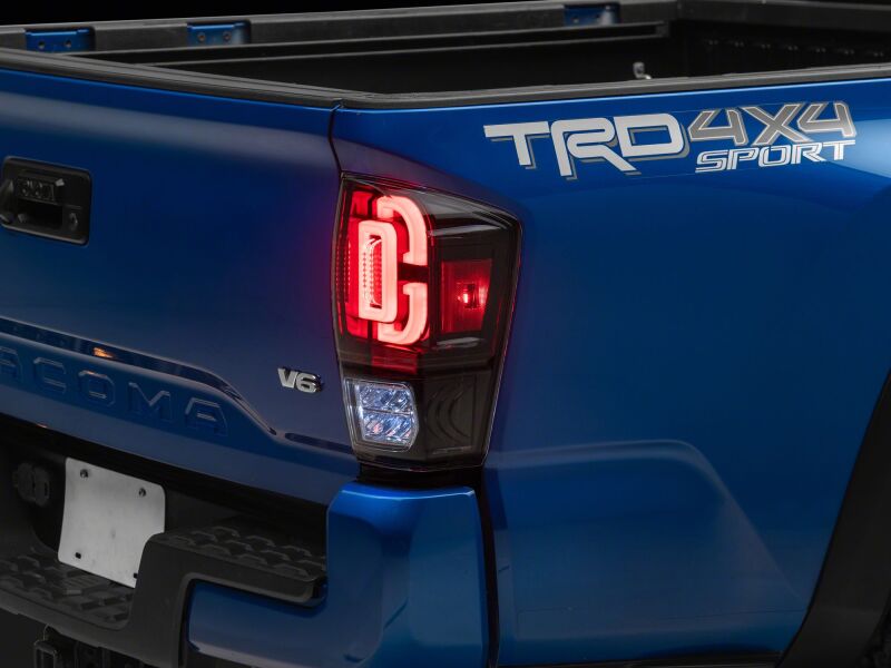 Raxiom 16-23 Toyota Tacoma XW Series Sequential LED Tail Lights- Black Housing- Clear Lens