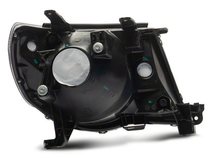 Raxiom 05-11 Toyota Tacoma Axial Series OE Replacement Headlights- Black Housing (Clear Lens)