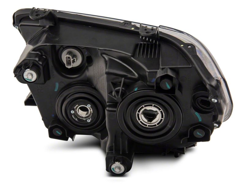 Raxiom 07-13 Toyota Tundra Axial Projector Headlights w/ SEQL LED Bar- Black Housing (Clear Lens)