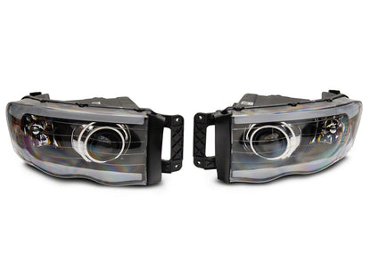 Raxiom 02-05 Dodge RAM 1500/2500/3500 Axial LED Projector Headlights- Black Housing (Clear Lens)