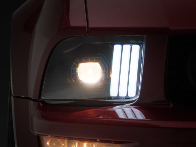 Raxiom 05-09 Ford Mustang w/ Halogen Projector Headlights- Black Housing (Clear Lens) (No GT500 )