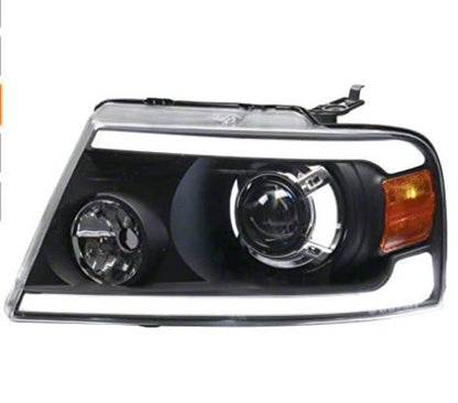 Raxiom 04-08 Ford F-150 Axial Series LED Projector Headlights- Black Housing (Clear Lens)