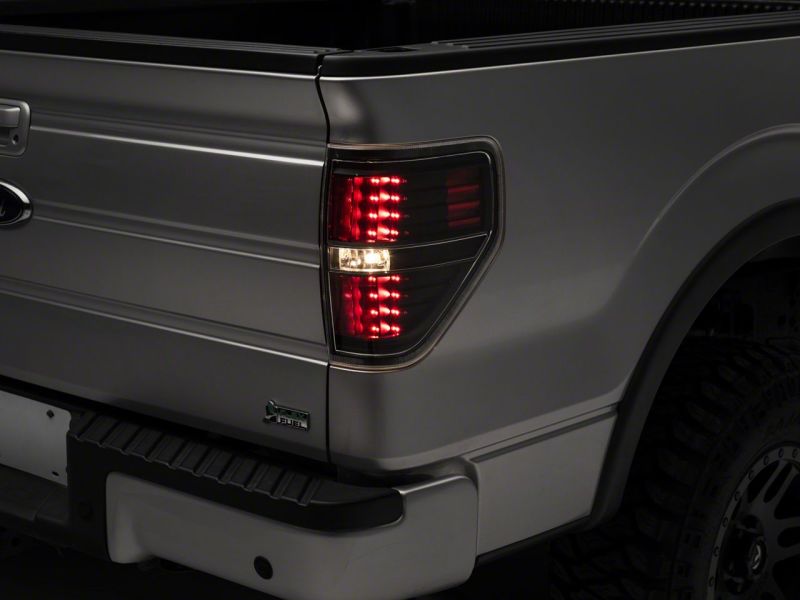 Raxiom 09-14 Ford F-150 Styleside LED Tail Lights- Black Housing (Clear Lens)