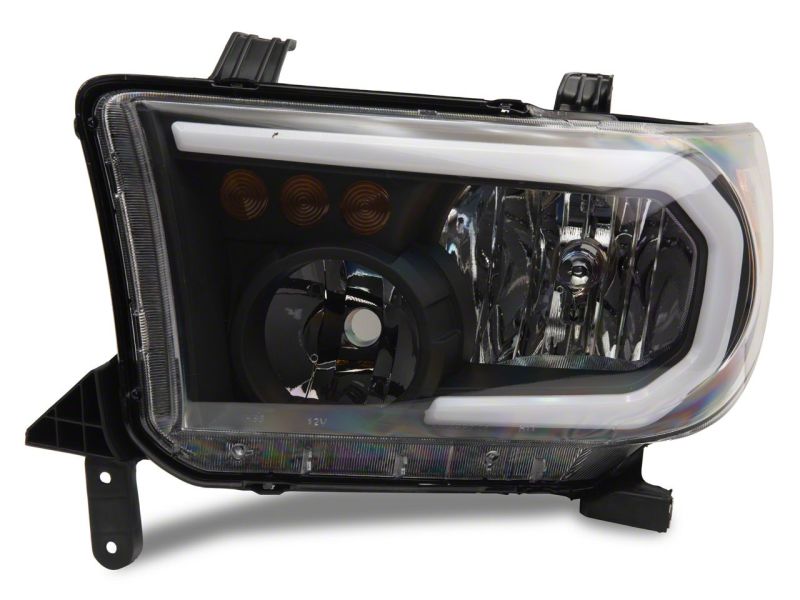 Raxiom 07-13 Toyota Tundra Axial Series Headlights w/ SEQL LED Bar- Black Housing (Clear Lens)