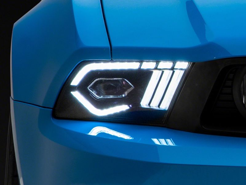 Raxiom 10-12 Ford Mustang w/ Factory Halogen LED Projector Headlights- Black Housing (Clear Lens)