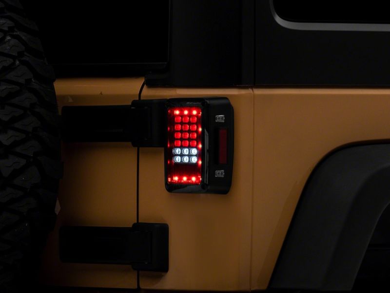 Raxiom 07-18 Jeep Wrangler JK Axial Series LED Tail Lights- Black Housing (Clear Lens)