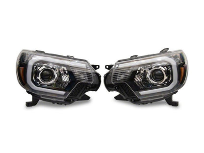 Raxiom 12-15 Toyota Tacoma Axial Series Projector Headlights w/ LED Bar- Black Housing (Clear Lens)