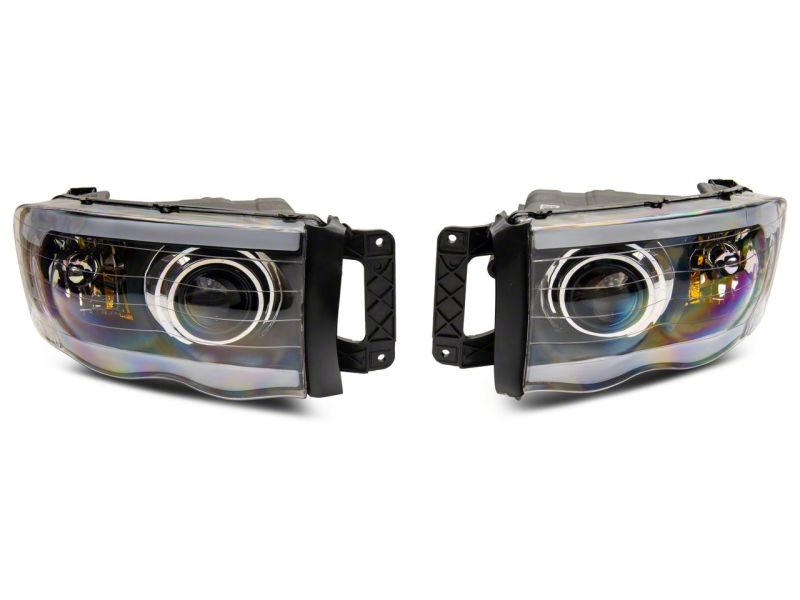 Raxiom 02-05 Dodge RAM 1500 LED Projector Headlights w/ SEQL LED Bar- Black Housing (Clear Lens)