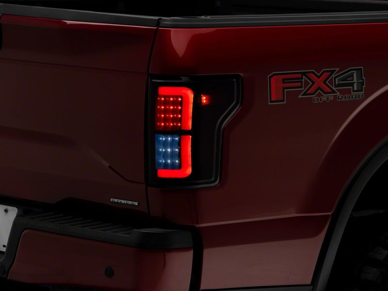 Raxiom 15-17 Ford F-150 Axial Series LED Tail Lights- Black Housing (Smoked Lens)