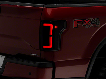 Raxiom 15-17 Ford F-150 Axial Series LED Tail Lights- Black Housing (Smoked Lens)