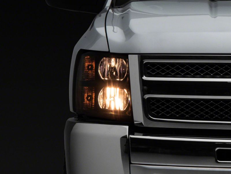 Raxiom 07-13 Chevrolet Silverado 1500 Euro Headlights- Black Housing (Clear Lens)