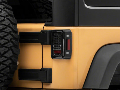 Raxiom 07-18 Jeep Wrangler JK Axial Series LED Tail Lights- Black Housing (Clear Lens)