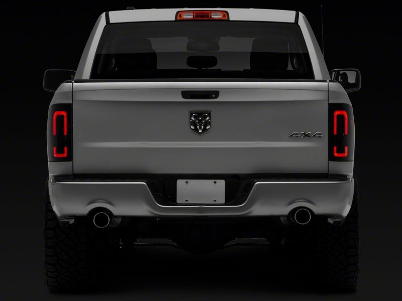 Raxiom 09-18 Dodge RAM 1500/2500/3500 Axial Series LED Tail Lights- Black Housing (Smoked Lens)